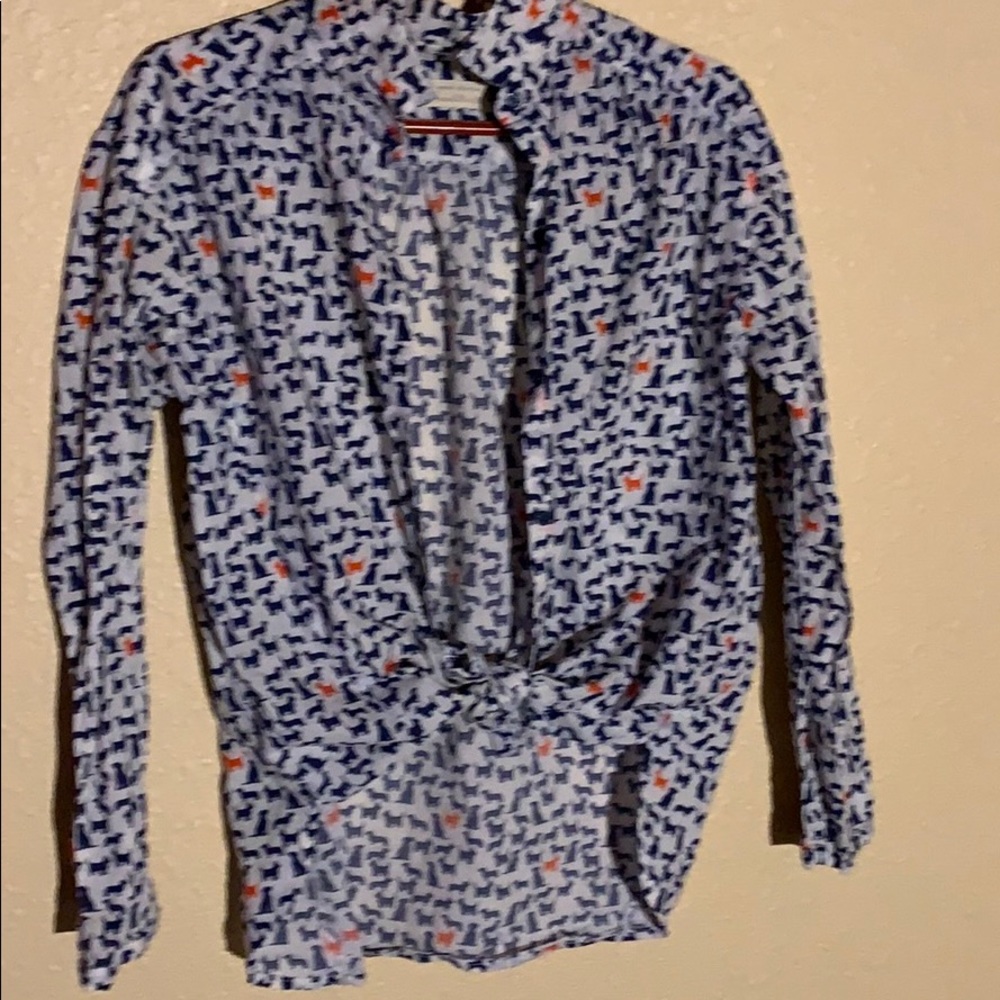 Buttoned down, long sleeve top.